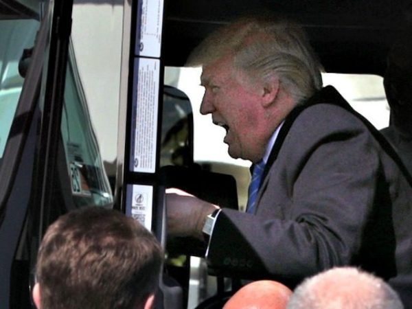 WASHINGTON, DC - MARCH 23:  U.S. President Donald Trump sits in the cab of a truck as he welcomes members of American Trucking Associations to the White House March 23, 2017 in Washington, DC. President Trump hosted truckers and CEOs for a listening session on healthcare.  (Photo by Alex Wong/Getty Images)